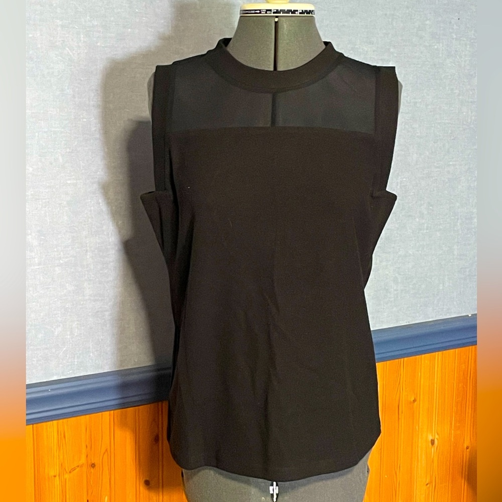 Black sleeveless knit top with mesh